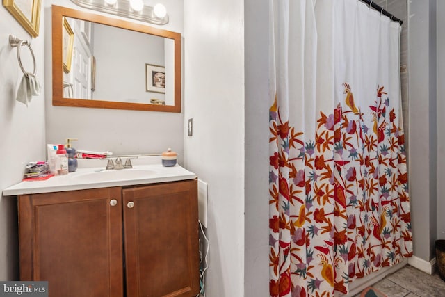 bathroom featuring vanity and a shower with curtain