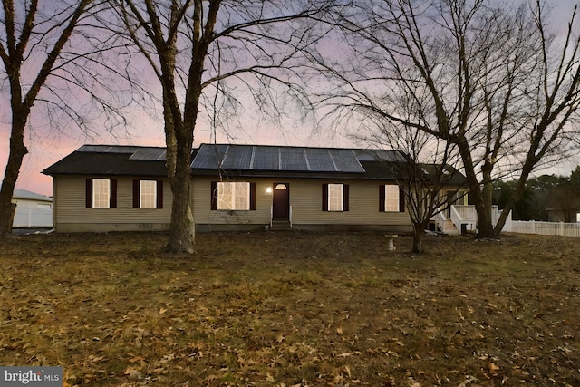 23338 Park Ave, Georgetown, DE 19947 - view of front of home with a lawn and solar panels