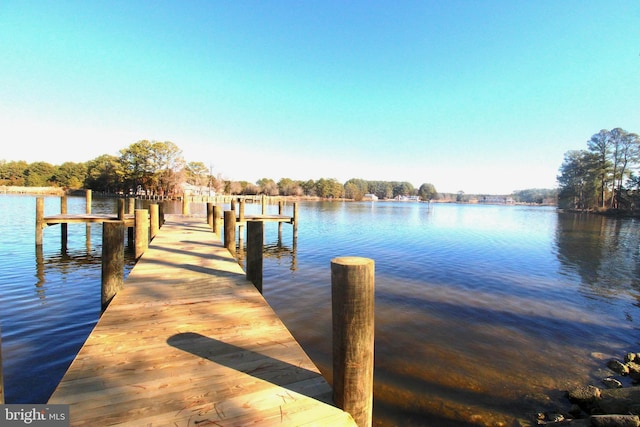 view of dock with a water view