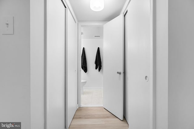 128 Roberts Ln Unit 301, Alexandria, VA 22314 - corridor with light wood-style flooring