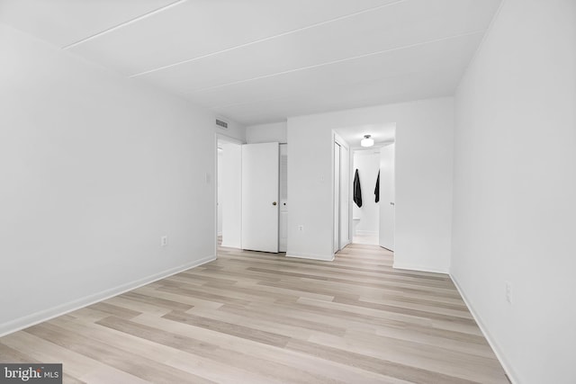 128 Roberts Ln Unit 301, Alexandria, VA 22314 - unfurnished room featuring light wood-style flooring and baseboards