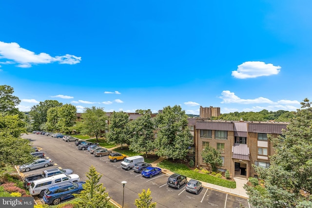 128 Roberts Ln Unit 301, Alexandria, VA 22314 - view of building exterior featuring uncovered parking