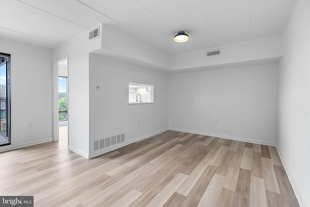 128 Roberts Ln Unit 301, Alexandria, VA 22314 - unfurnished room featuring light wood-style floors and baseboards