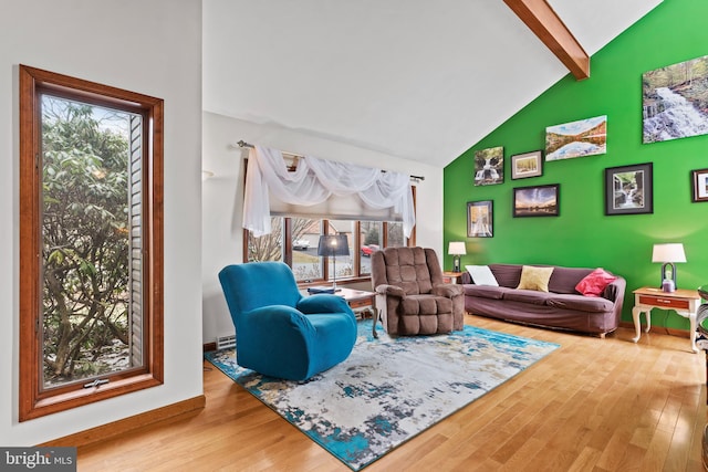 living room with beamed ceiling, high vaulted ceiling, and wood-type flooring