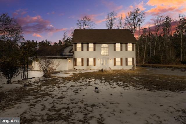 colonial home featuring a garage