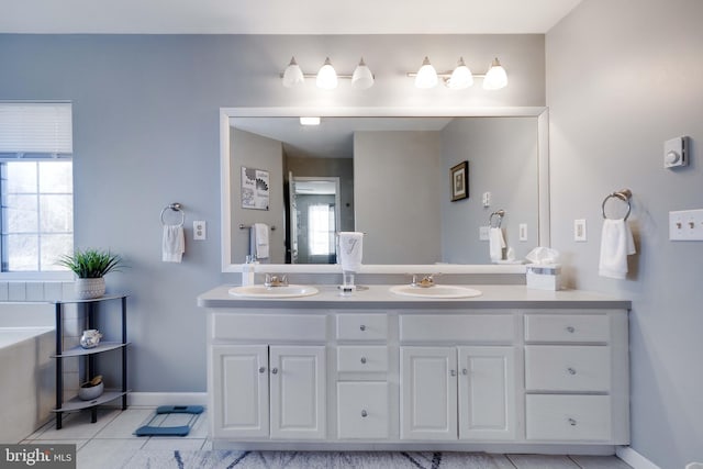 bathroom with vanity and tile patterned floors