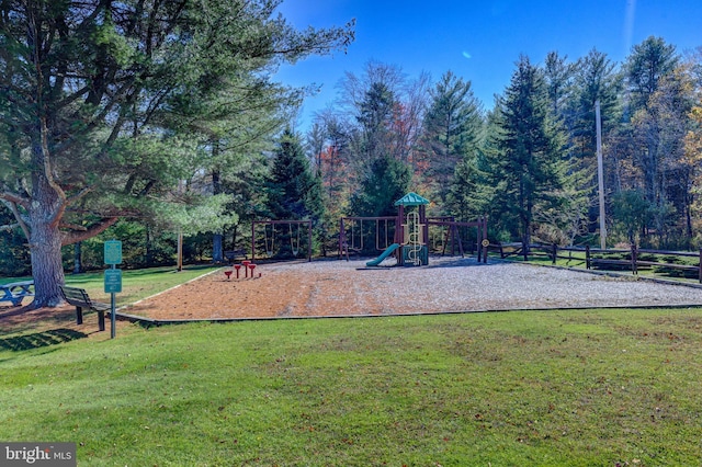 view of play area featuring a lawn