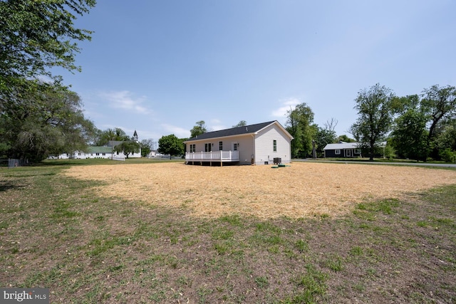 122 3rd St, Crumpton, MD 21628 - view of grassy yard with a deck