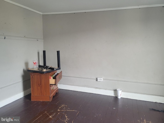 office space featuring crown molding and dark wood-type flooring