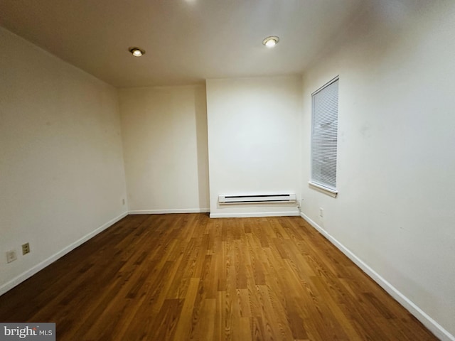 2018 S 7th St, Philadelphia, PA 19148 - unfurnished room with baseboard heating, wood finished floors, baseboards, and recessed lighting