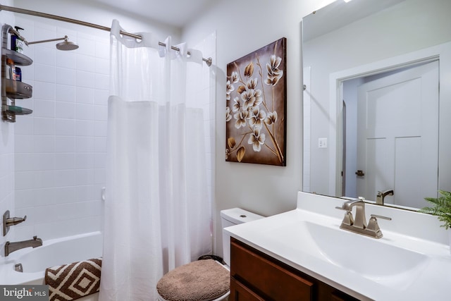 full bathroom with shower / tub combo with curtain, vanity, and toilet