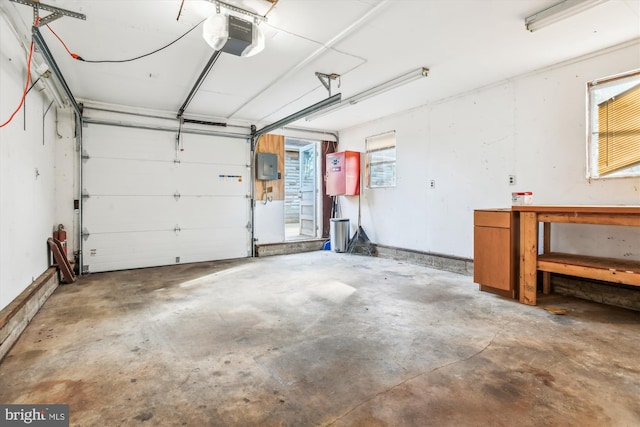 garage featuring a garage door opener and electric panel