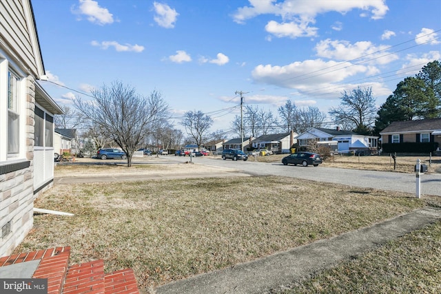 view of yard with a residential view