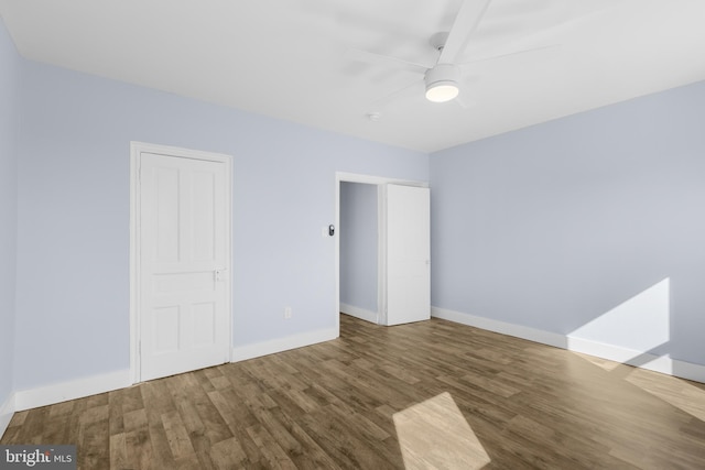 interior space with hardwood / wood-style flooring and ceiling fan