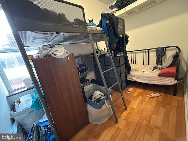 bedroom featuring hardwood / wood-style floors