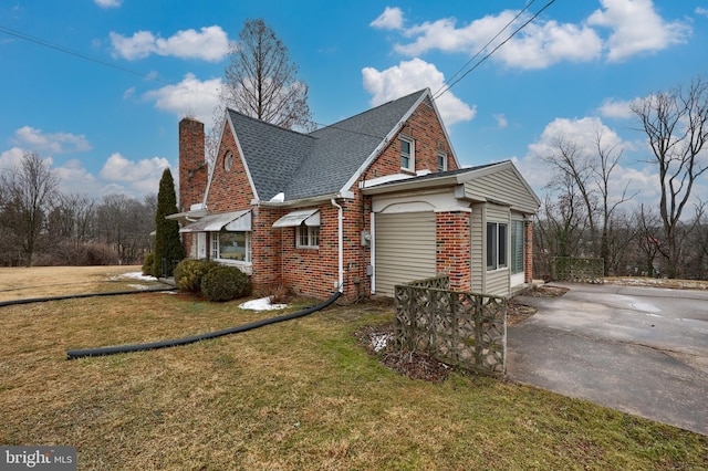 view of home's exterior featuring a yard