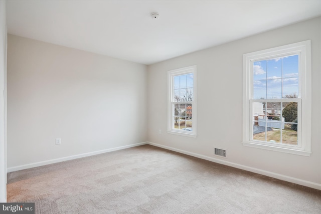 view of carpeted spare room