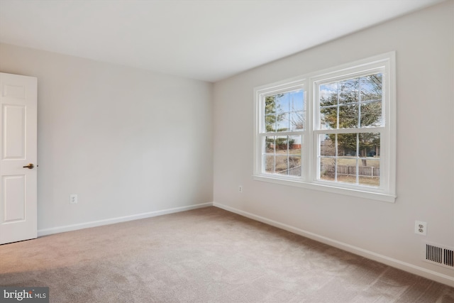 view of carpeted spare room