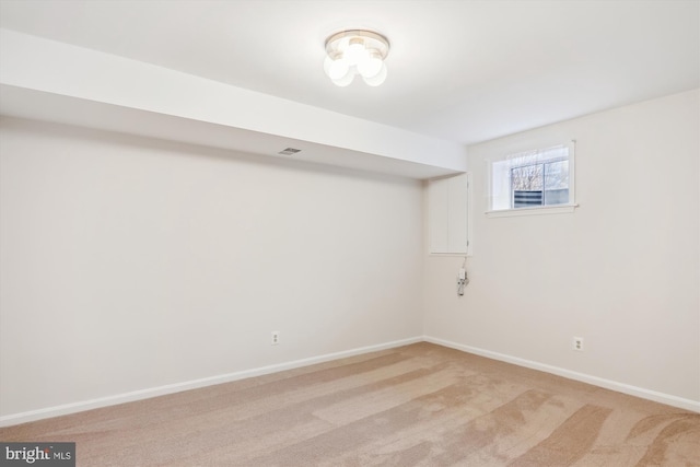 basement with light colored carpet