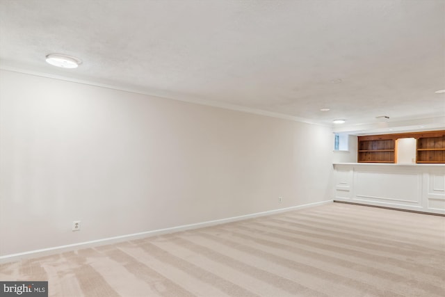 unfurnished living room with light carpet