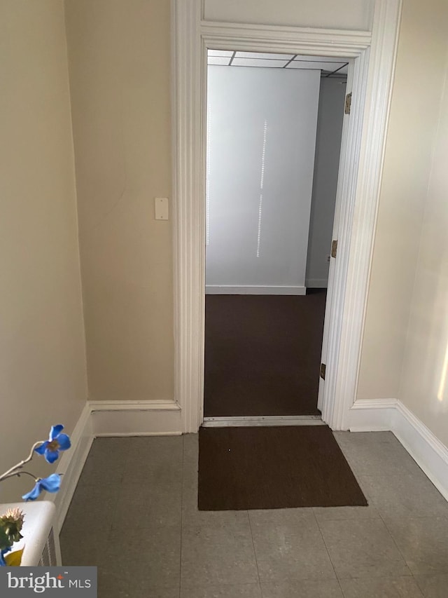 interior space with dark tile patterned floors