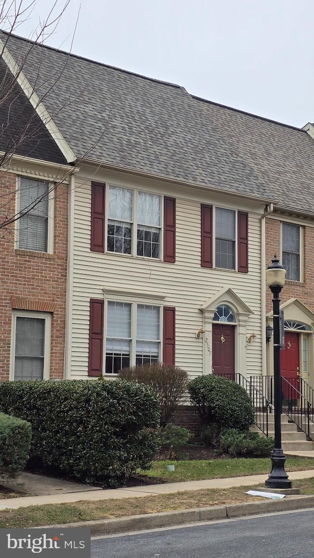 multi unit property with roof with shingles