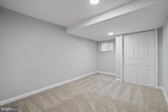 basement featuring carpet flooring