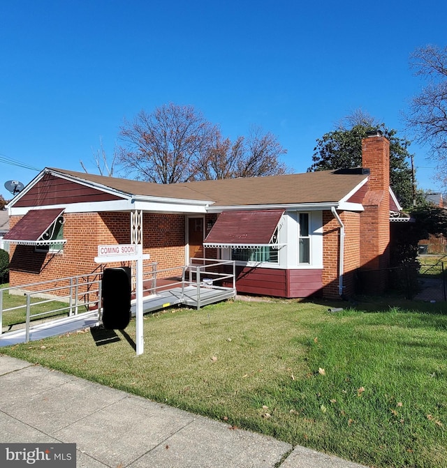 view of front of house with a front yard