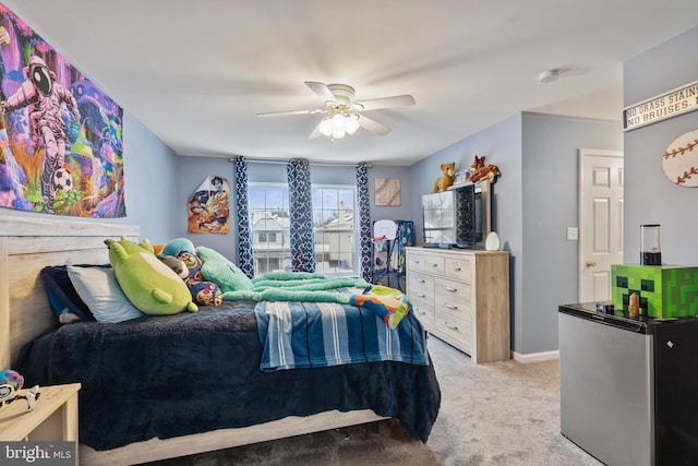 carpeted bedroom with ceiling fan