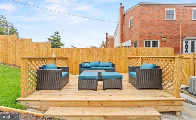 deck with an outdoor hangout area