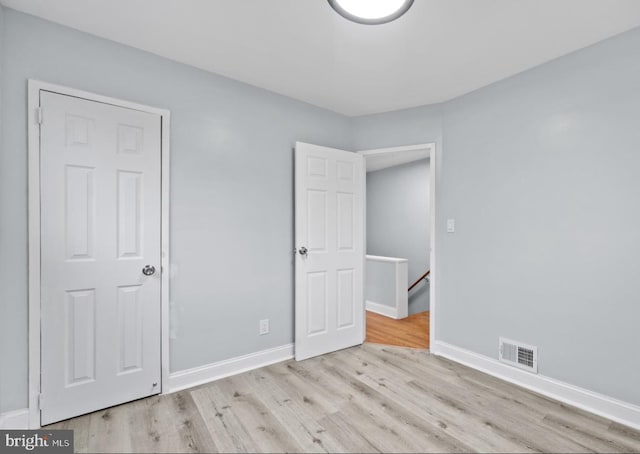 unfurnished bedroom featuring light hardwood / wood-style flooring