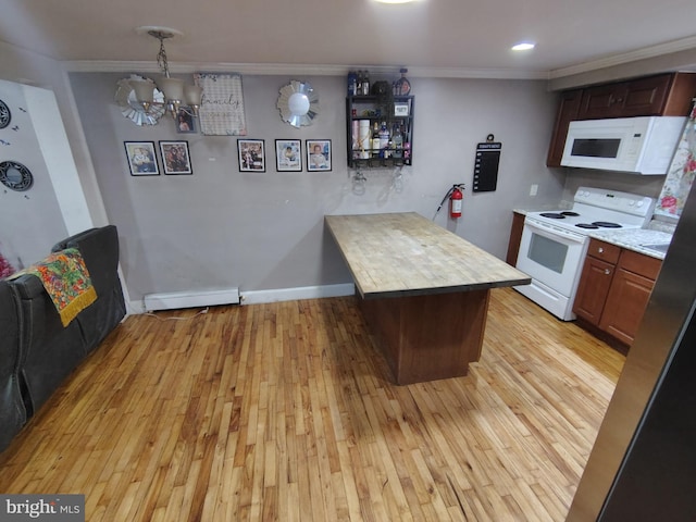 kitchen featuring crown molding, white appliances, a baseboard heating unit, and light wood-type flooring