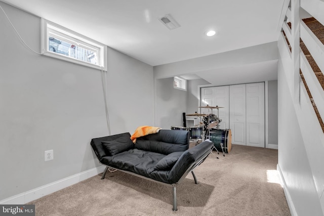 living area with carpet