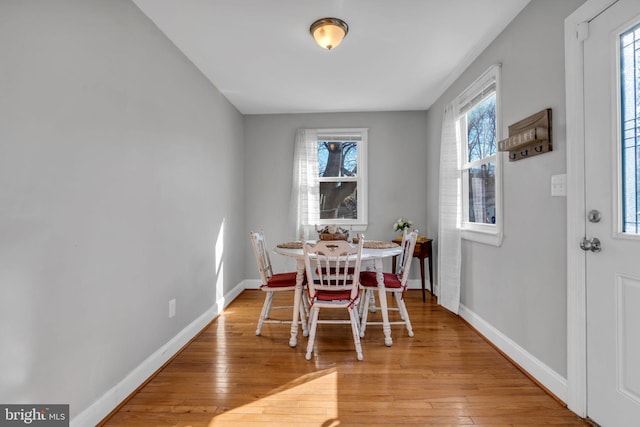 dining room featuring light hardwood / wood-style floors