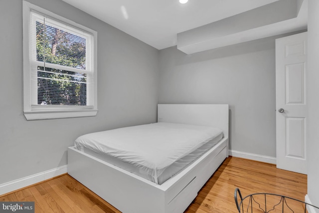 bedroom featuring light wood-type flooring