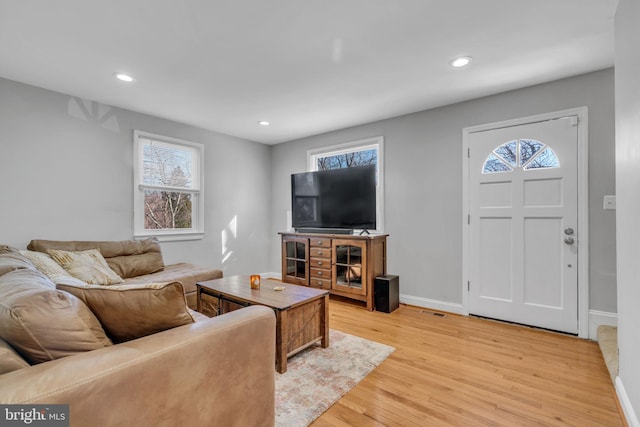 living room featuring light wood-type flooring