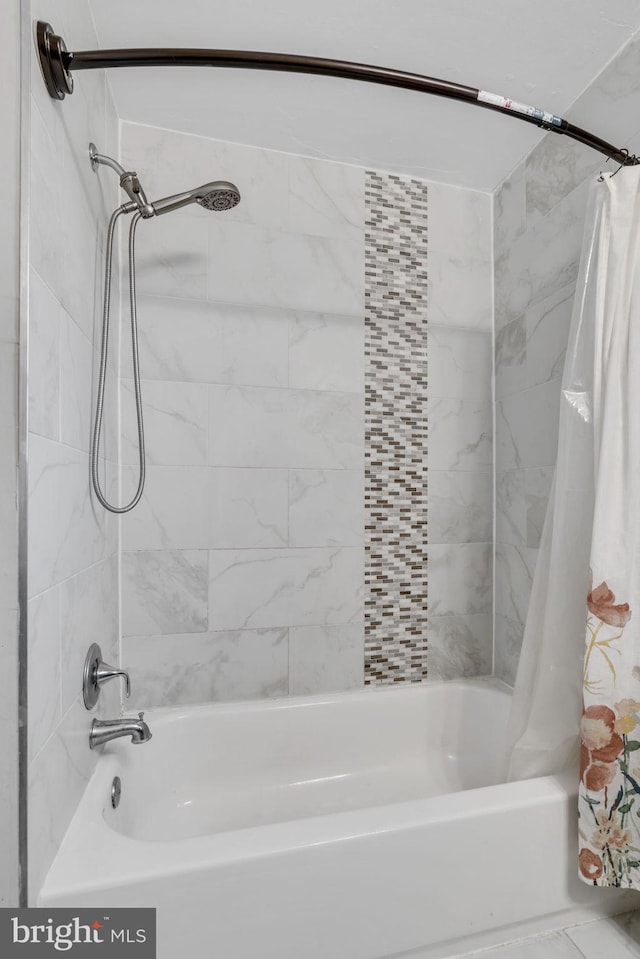 bathroom featuring shower / tub combo