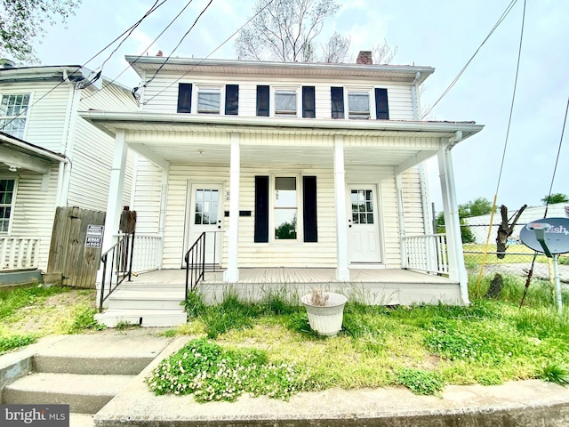 view of front of property featuring covered porch