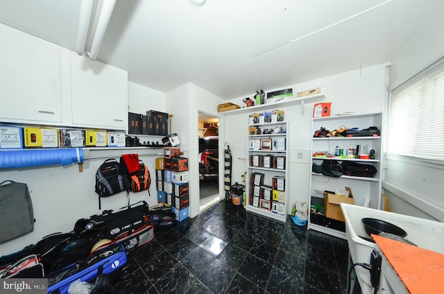 interior space featuring white cabinets