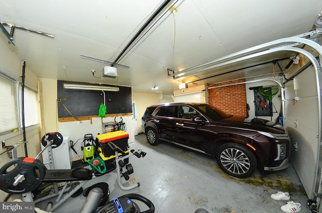 garage featuring a garage door opener