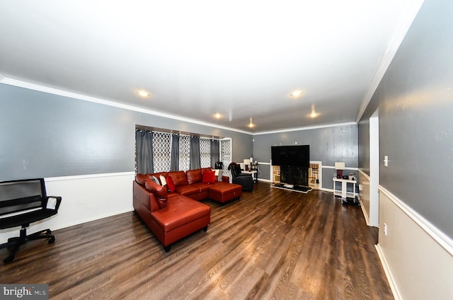 living room featuring ornamental molding and dark wood-type flooring