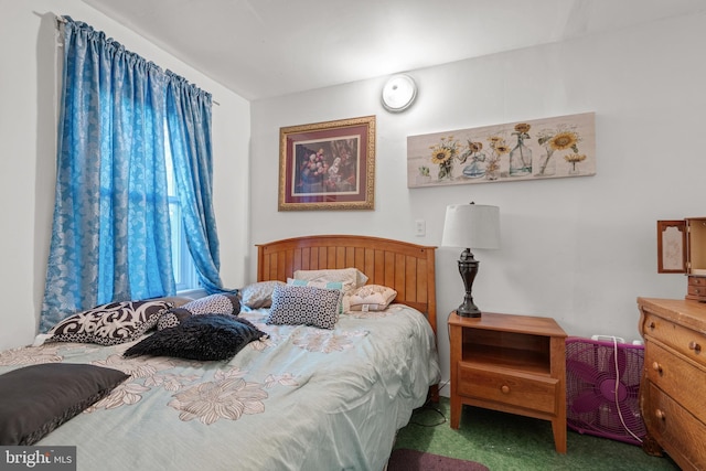 bedroom featuring carpet flooring