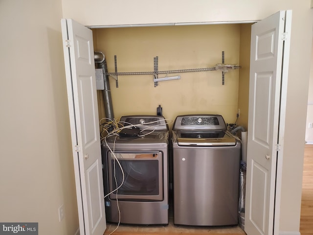 laundry area featuring independent washer and dryer