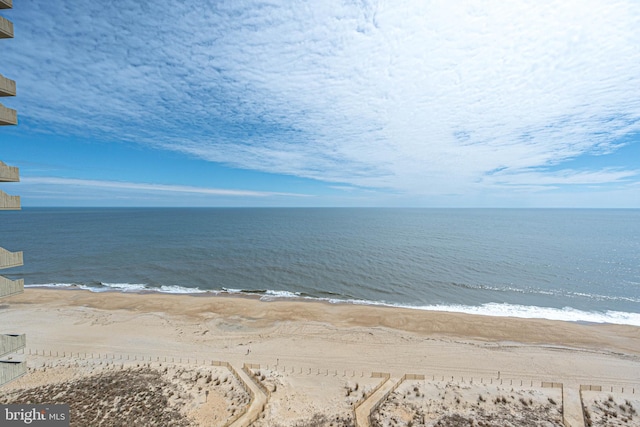 property view of water featuring a beach view