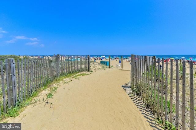 property view of water featuring a view of the beach