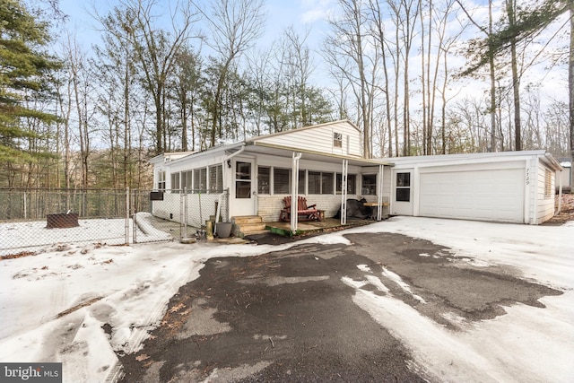 view of front of home with a garage