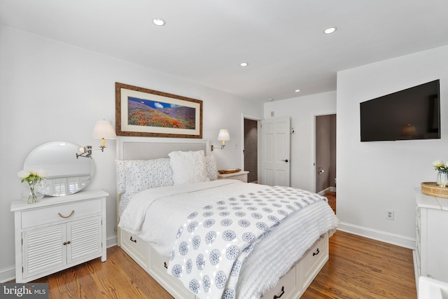 bedroom featuring wood-type flooring