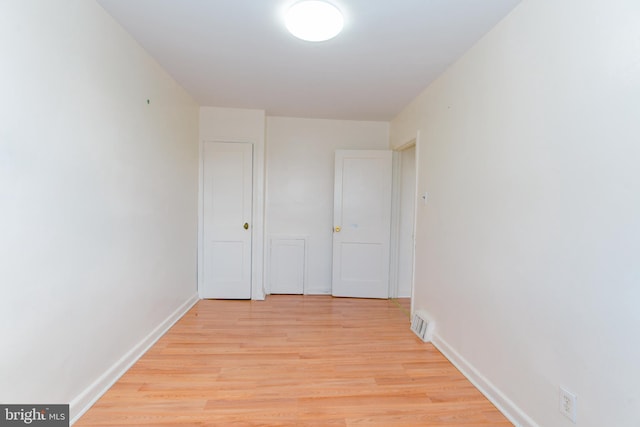 hallway featuring light wood-type flooring