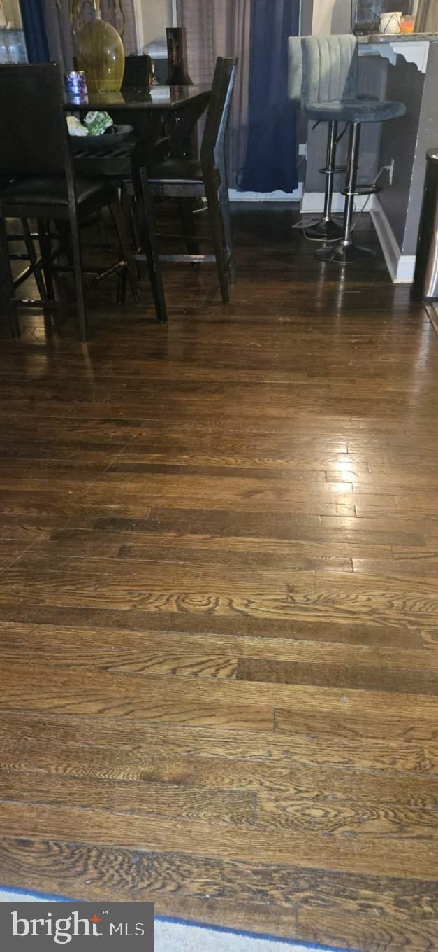 interior space with dark hardwood / wood-style floors