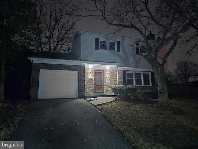 view of front of property featuring a garage